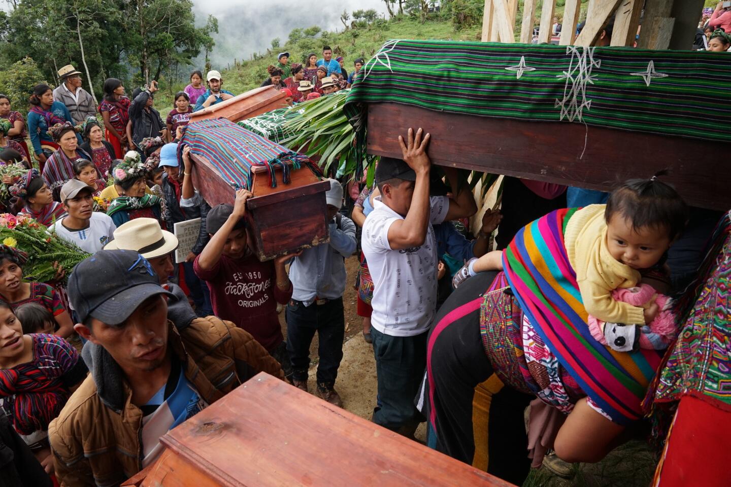 Guatemalan village ravaged by war brings home its dead