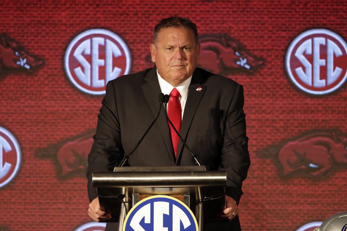 FILE - Arkansas head coach Sam Pittman speaks to reporters during an NCAA college football news conference at the Southeastern Conference media days in Hoover, Ala., in this Thursday, July 22, 2021, file photo. Arkansas is feeling good about coach Sam Pittman after last season’s 3-7 campaign produced much more competitive football than in recent years. (AP Photo/Butch Dill, File)