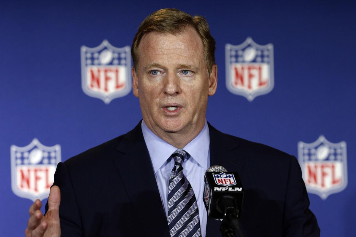 NFL Commissioner Roger Goodell talks to reporters on May 24.