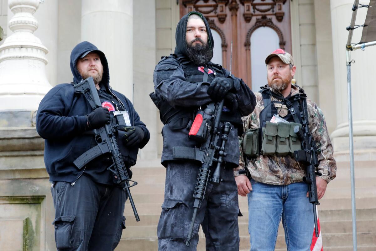 Armed protesters at the Michigan Capitol last year.