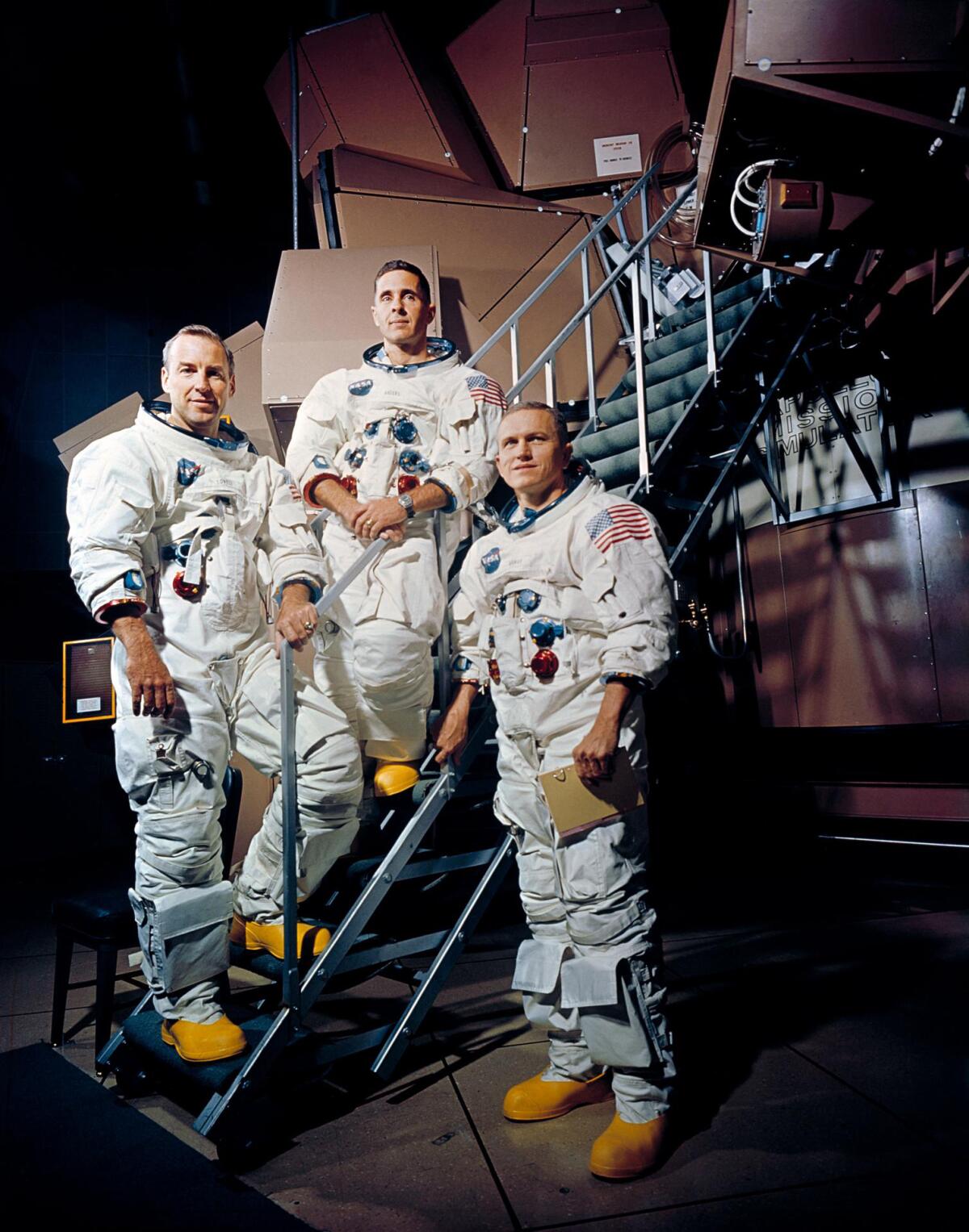 Three astronauts in their spacesuits