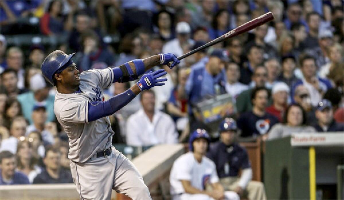 Hanley Ramirez drives in two runs in the third inning of the Dodgers' 6-4 victory over the Chicago Cubs at Wrigley Field on Thursday.
