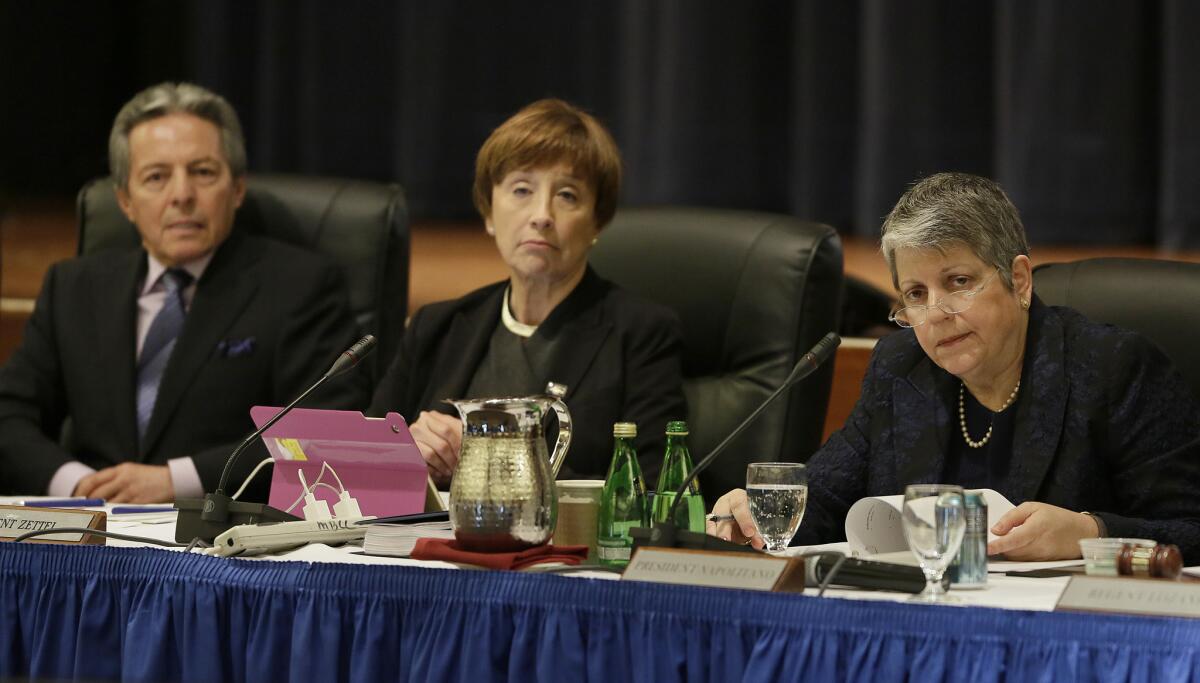 UC regents Hadi Makarechian, left, and Charlene Zettel and UC President Janet Napolitano listen to public comment during a 2016 meeting in San Francisco.