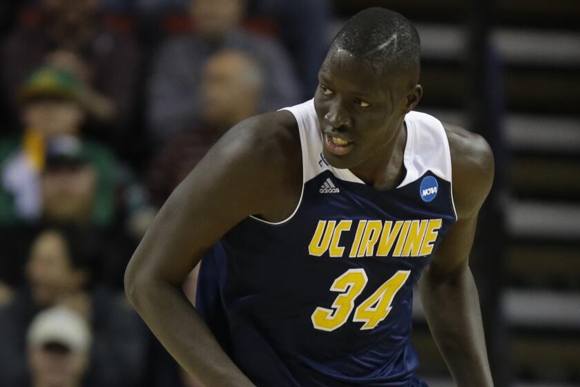 UC Irvine center Mamadou Ndiaye runs up the court during a loss to Louisville in the NCAA tournament on March 20.