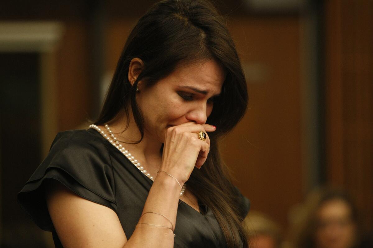 Monica Andreny weeps as she makes a victim impact statement in court where her ex-husband was sentenced to nine years for trying to hire hit man to have her killed.