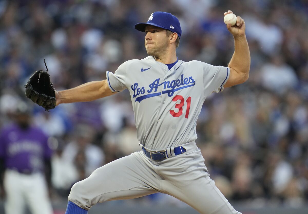 Dodgers relief pitcher Tyler Anderson throws against the Colorado Rockies in the fourth inning.