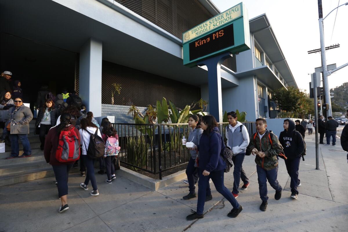Los Angeles Unified students are shown returning to classes in December after a threat received by the district forced school closures.