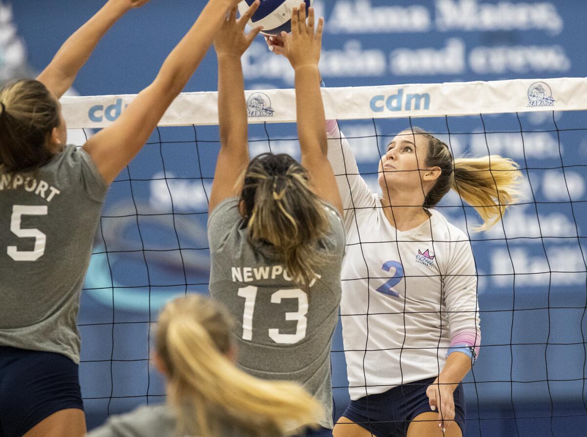 Corona del Mar's Reiley Murphy hits against Newport Harbor in a Battle of the Bay match on Sept. 28, 2022.