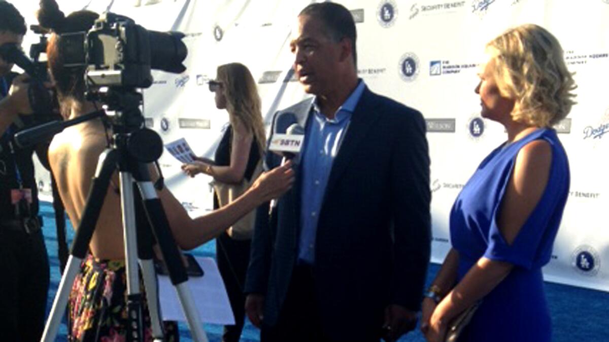 Dodgers Manager Dave Robert is interviewed on the "blue carpet" during the Blue Diamond Gala on Thursday night.