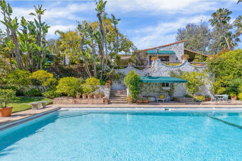 Built in 1934, the Spanish-style mansion maintains its Old Hollywood glamour with crystal chandeliers and ornate fireplaces.