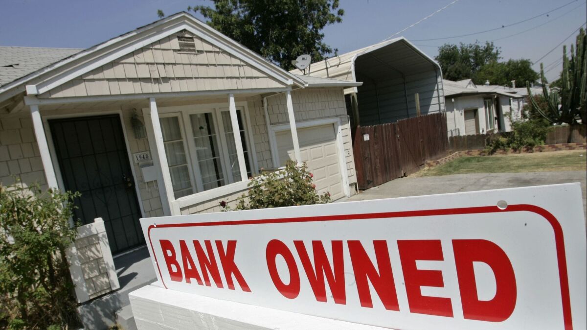 A sign of a house under foreclosure in Antioch, Calif. on Aug. 14, 2007.