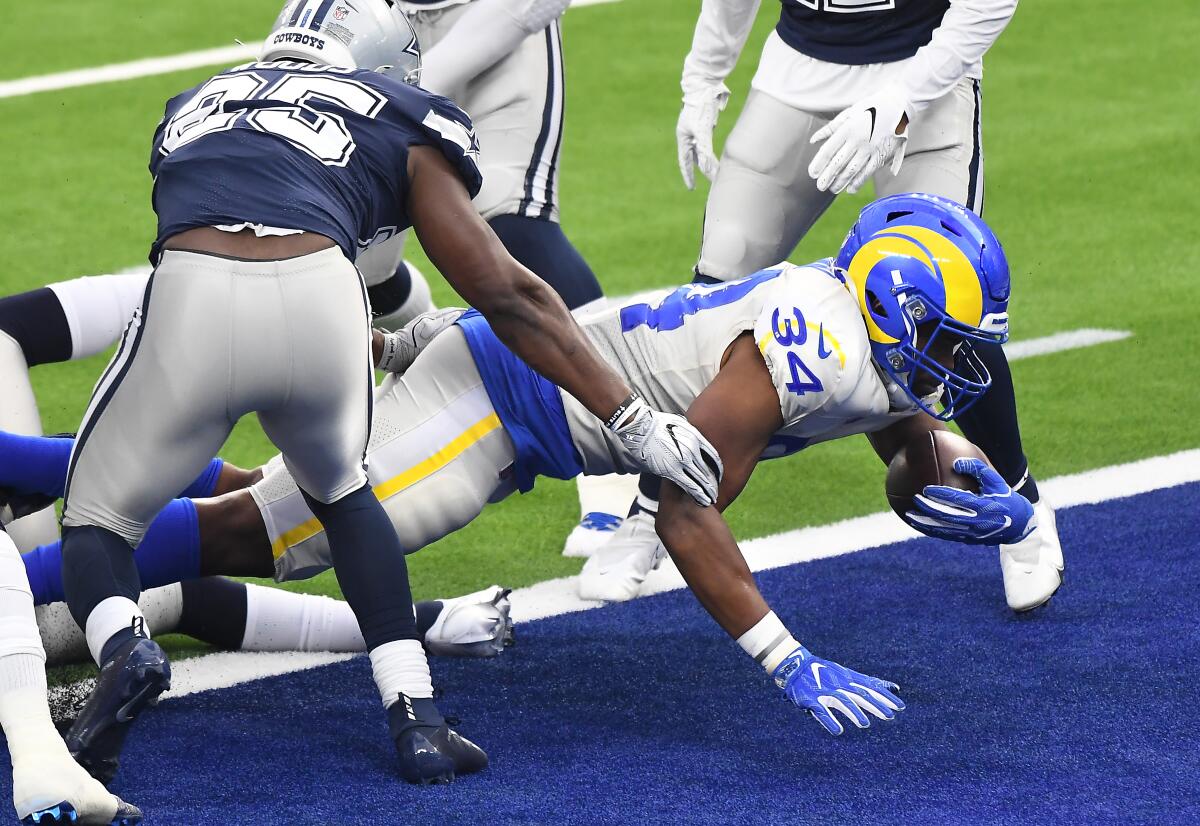 Rams running back Malcolm Brown scores a touchdown against the Dallas Cowboys.