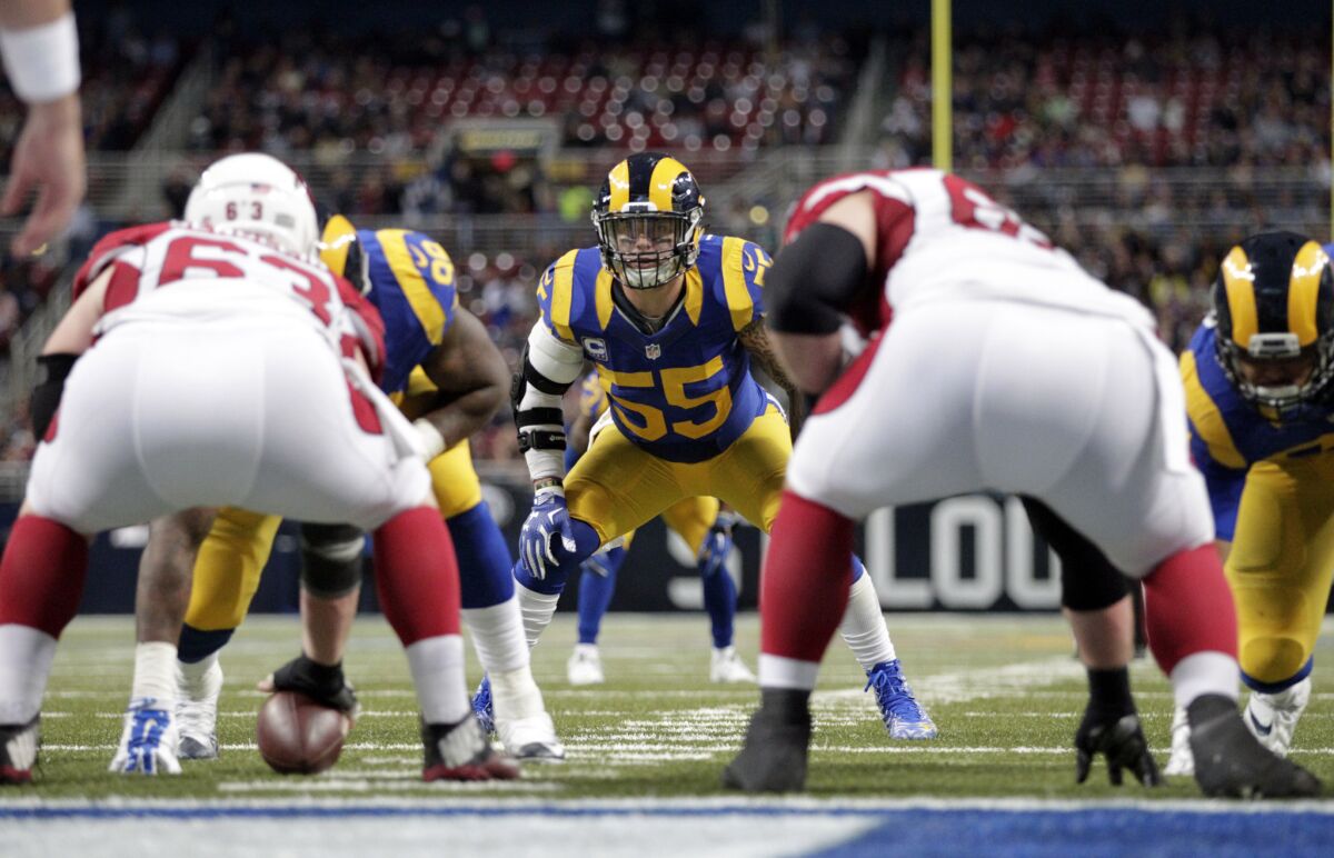 Rams linebacker James Laurinaitis (55) takes up his position during the third quarter of a game against the Cardinals on Dec. 6.