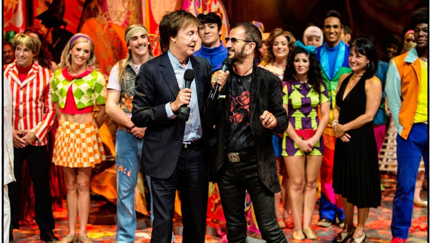 Paul McCartney, foreground left, and Ringo Starr celebrate the 10th anniversary of "Love" in Las Vegas.