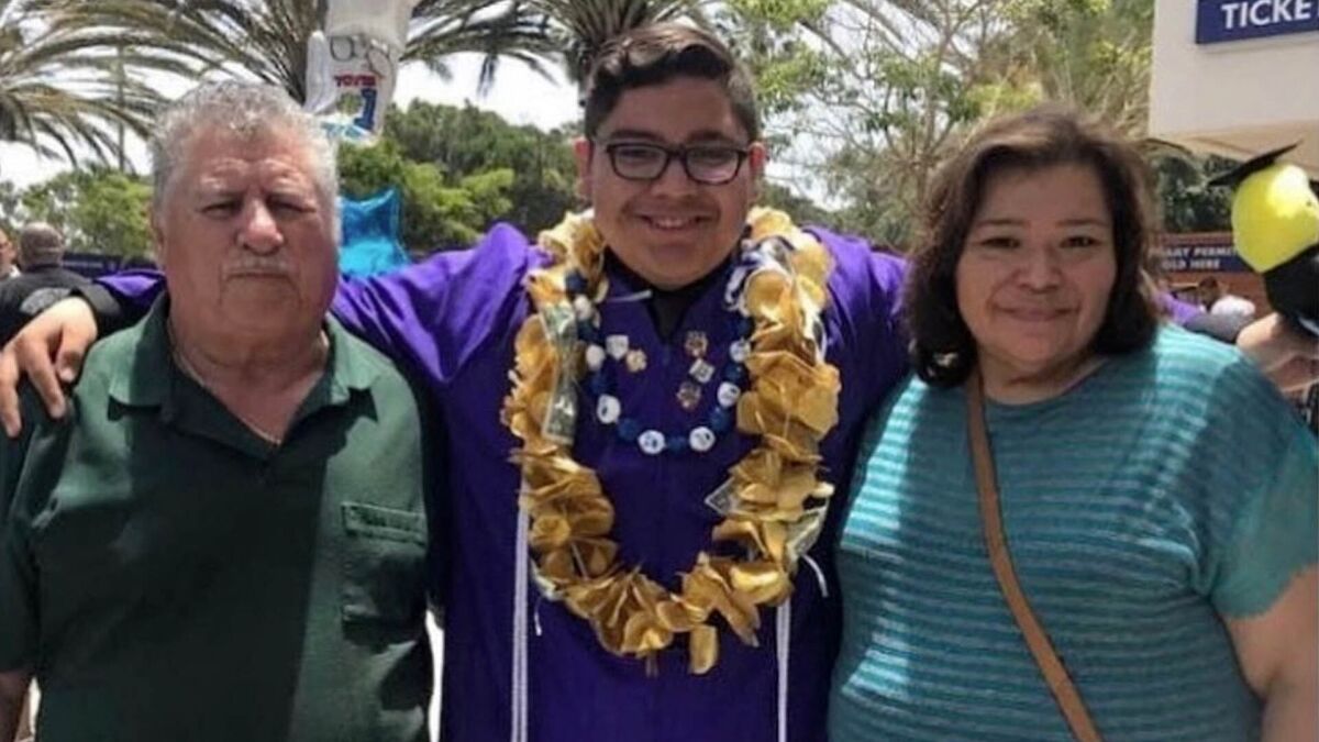 Manny Agredano, center, is pictured with his grandfather, Manuel, and his mother, Lisa