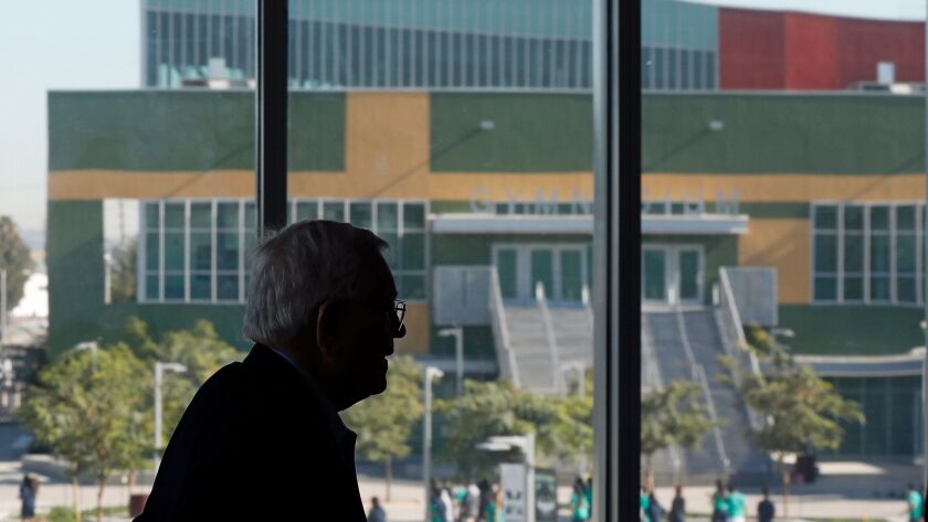 Former L.A. schools Supt. Roy Romer, as part of a 90th birthday celebration, tours the Maywood Center for Enriched Studies, the last of 131 campuses built in a $20-billion construction program he shaped.