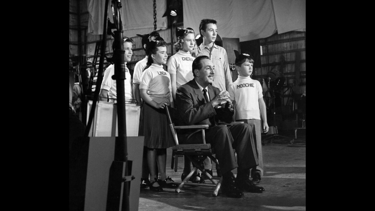 Kevin Corcoran, far right, beside Walt Disney and other cast members, appeared on "The Mickey Mouse Club" series as "Moochie" starting when he was about 7 years old.