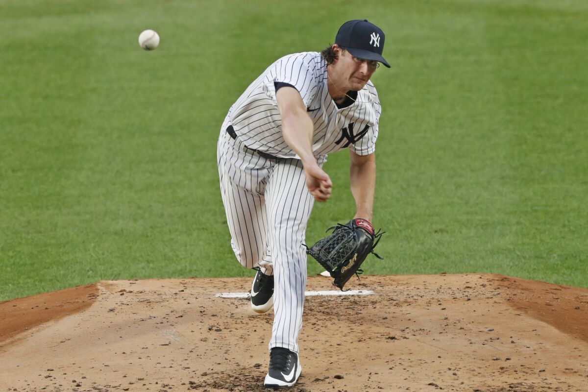 New York Yankees starting pitcher Gerrit Cole delivers during the second inning of a baseball game against the Philadelphia Phillies, Monday, Aug. 3, 2020, at Yankee Stadium in New York. (AP Photo/Kathy Willens)