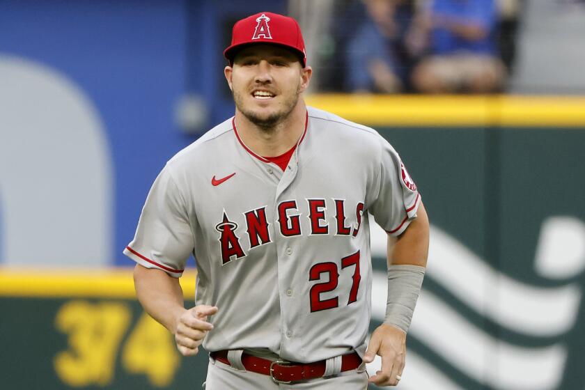 Los Angeles Angels center fielder Mike Trout (27) jogs prior to playing.