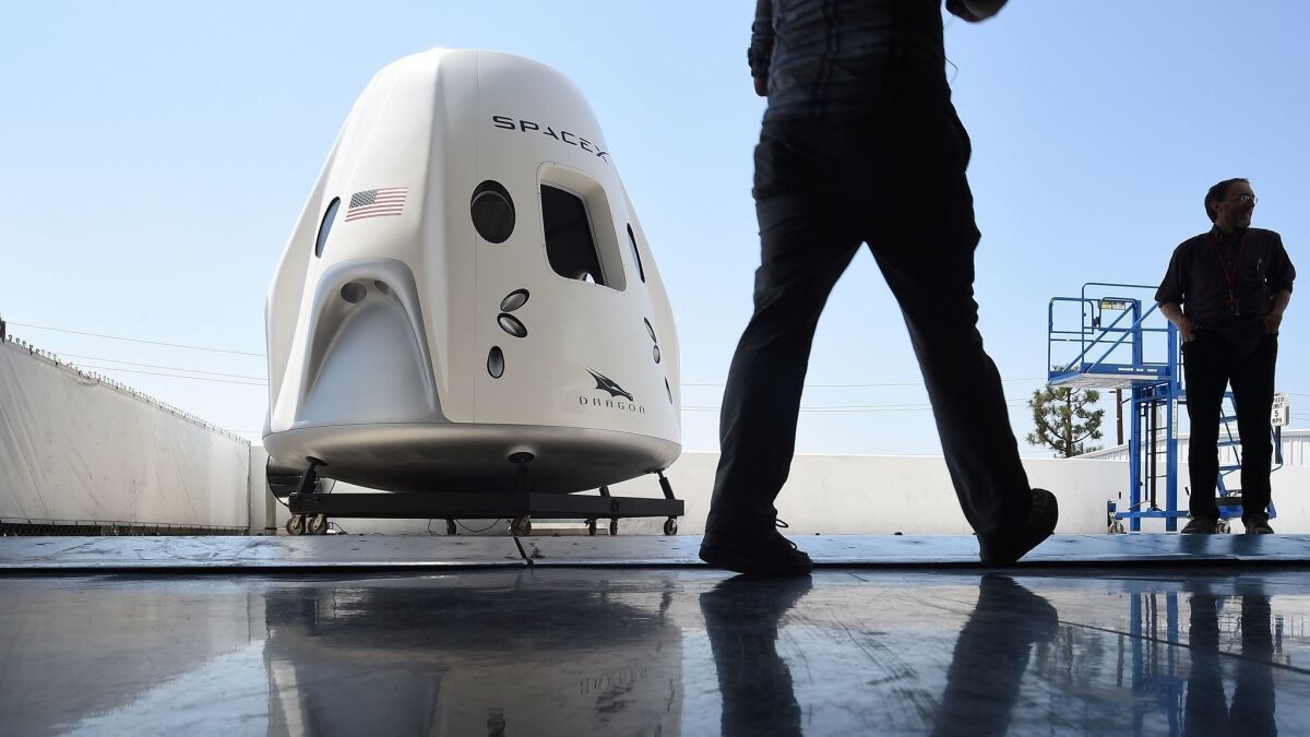 A mock-up of SpaceX's Crew Dragon spacecraft at the company's Hawthorne, Calif., headquarters.