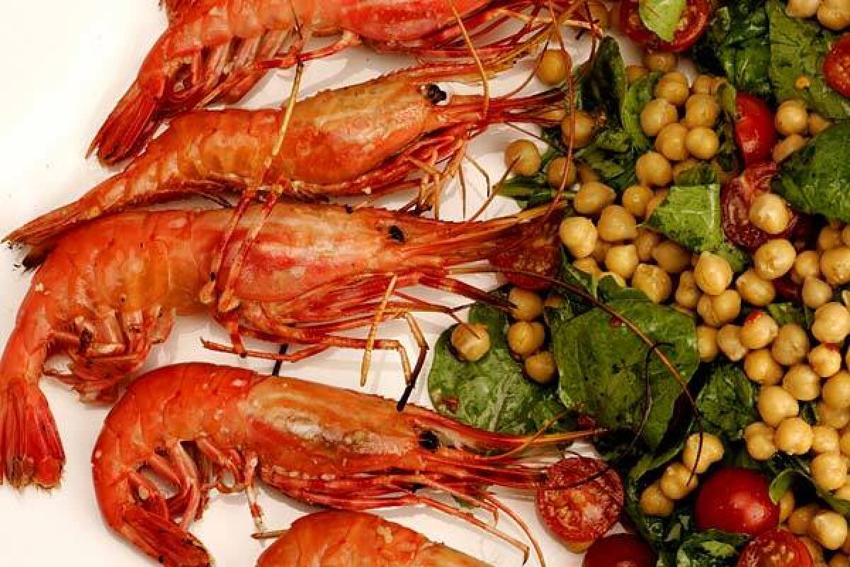SWEET MEAT: Serve grilled prawns with a simple salad of garbanzo beans and arugula.