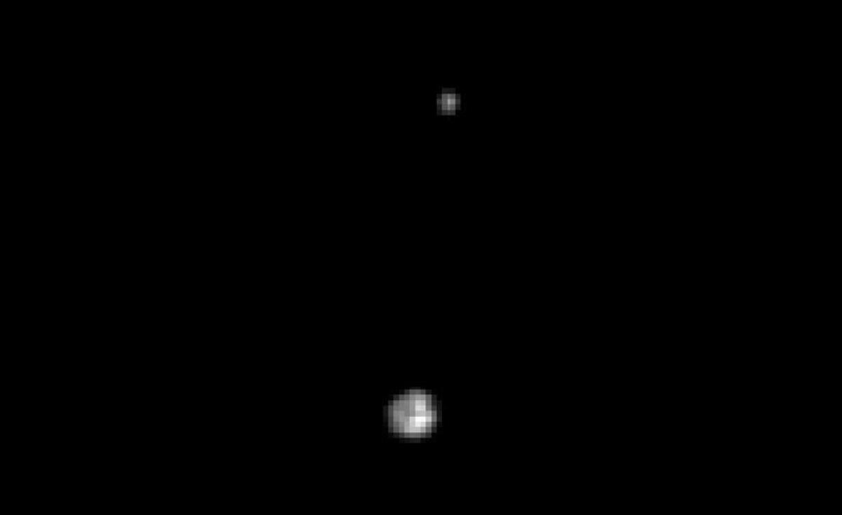 This Hubble image of Pluto and its moon Charon is the best picture of the dwarf planet that we have, for now.