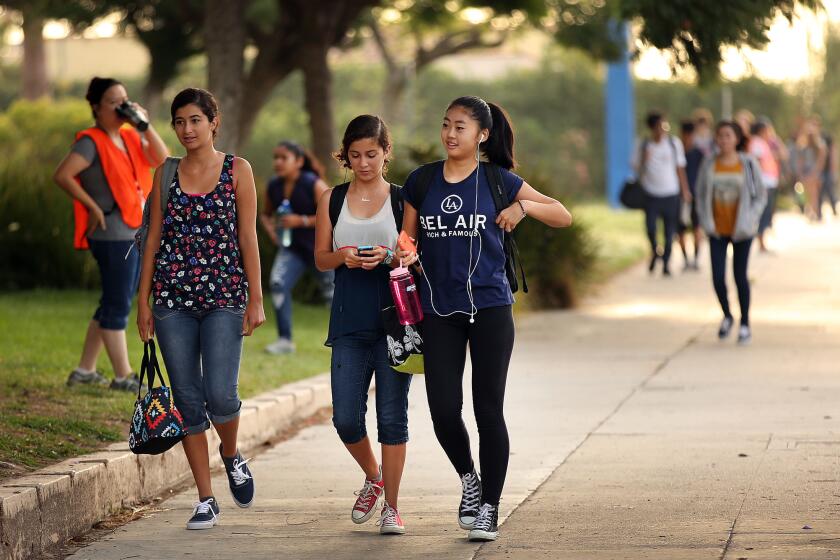 Students arrive for classes at the Los Angeles Center for Enriched Studies in 2015.