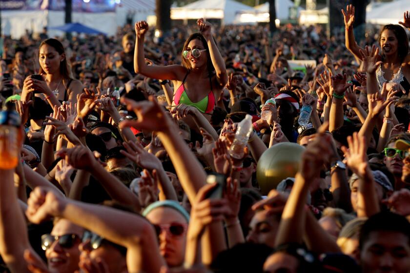 Fans cheer a performance by Odesza during Hard Summer at the Fairplex in Pomona on Saturday.