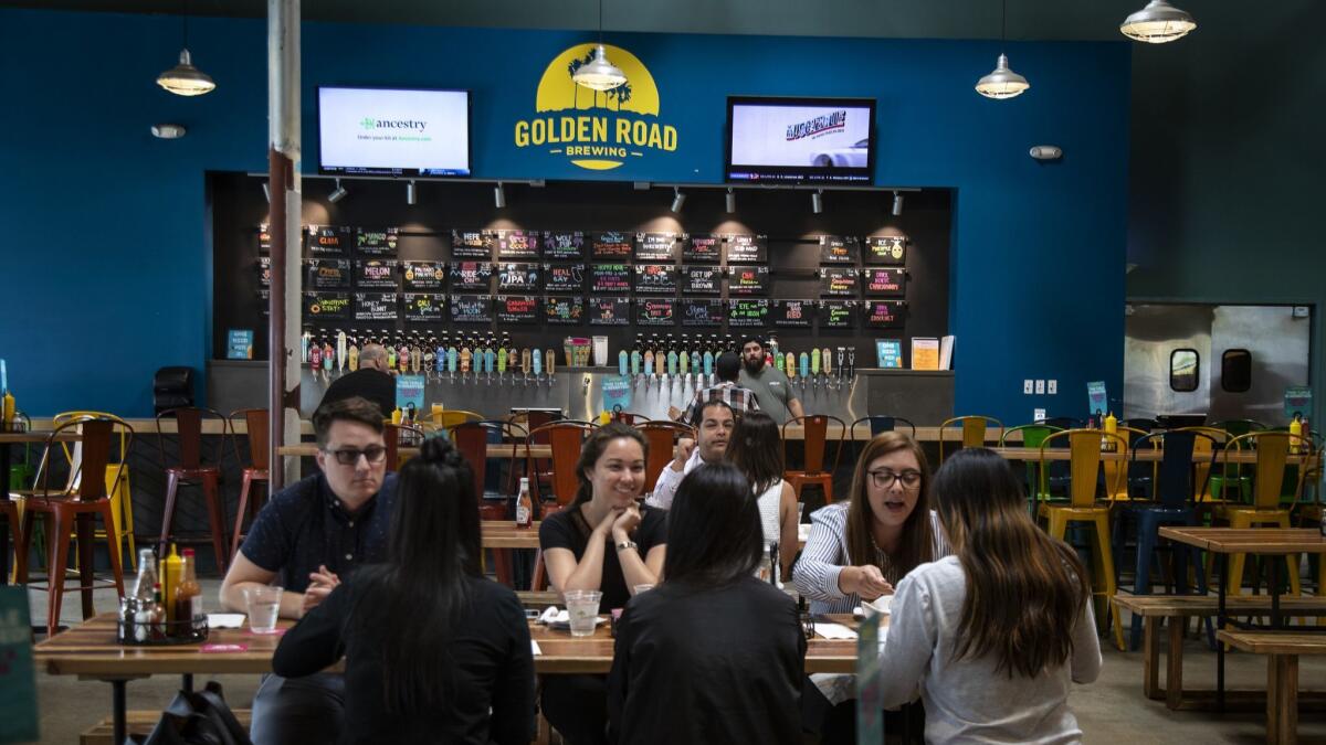 Customers enjoy lunch at Golden Road Brewing's location in Anaheim.