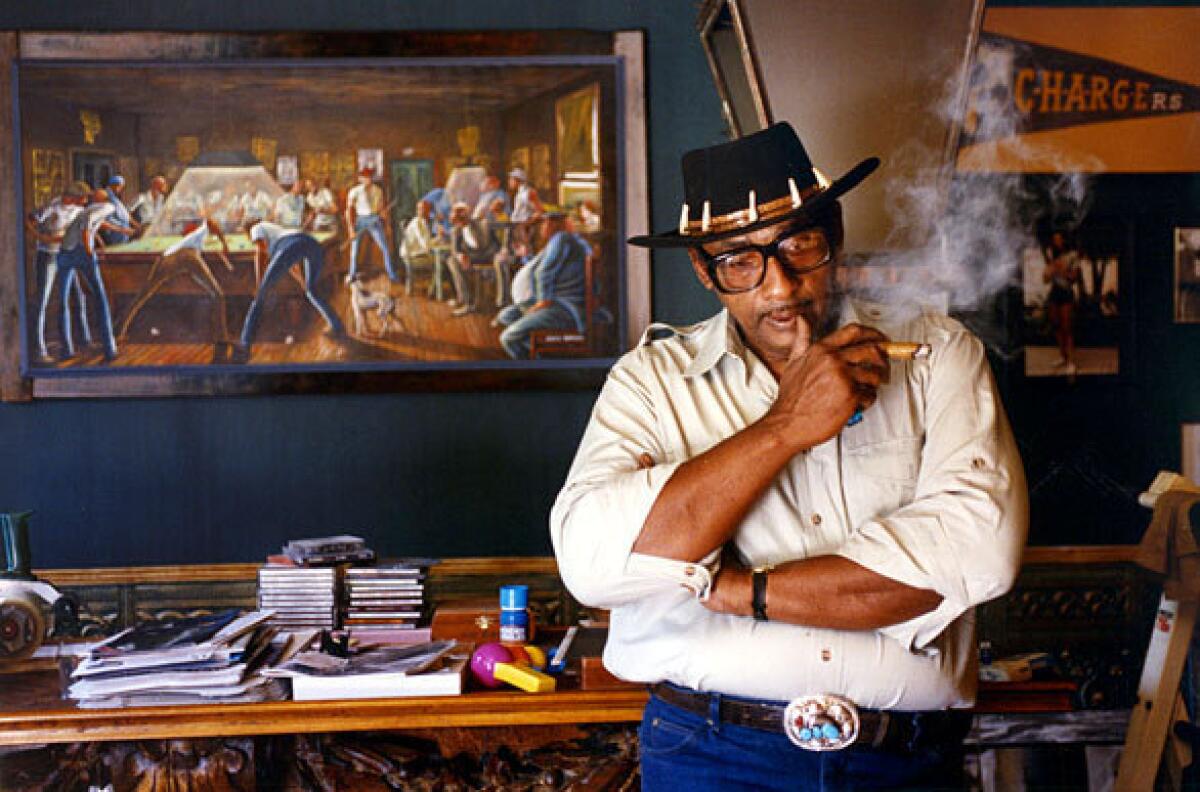 Artist Ernie Barnes in 1992 with his painting "Eight Ball."