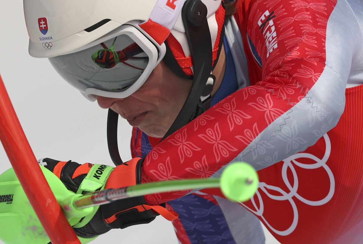 Petra Vlhova, of Slovakia passes a gate during the second run of the women's slalom at the 2022 Winter Olympics, Wednesday, Feb. 9, 2022, in the Yanqing district of Beijing. (AP Photo/Alessandro Trovati)