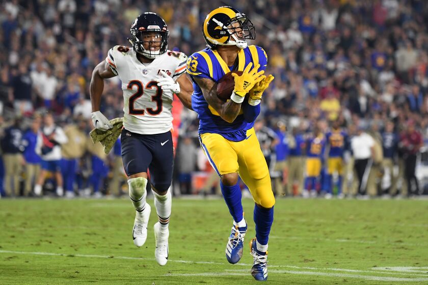 LOS ANGELES, NOVEMBER 17, 2019-Rams receiver Josh Reynolds catches a touchdown pass against the Bears defensive back Kyle Fuller in the 4th quarter but the play was called back on a Rams penalty at the Coliseum Sunday. (Wally Skalij/Los Angerles Times)