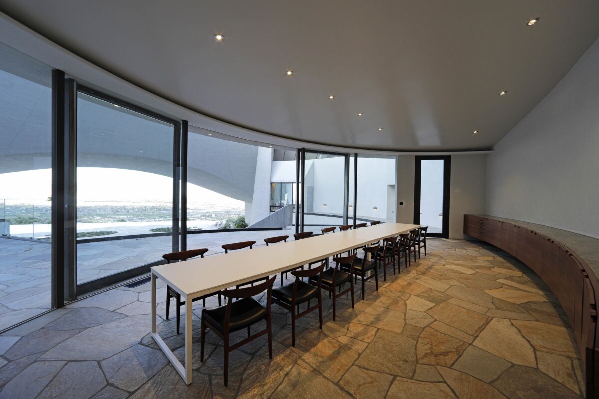 Upstairs dining room follows Lautner's minimalist vision. (Myung Chun / Los Angeles Times)