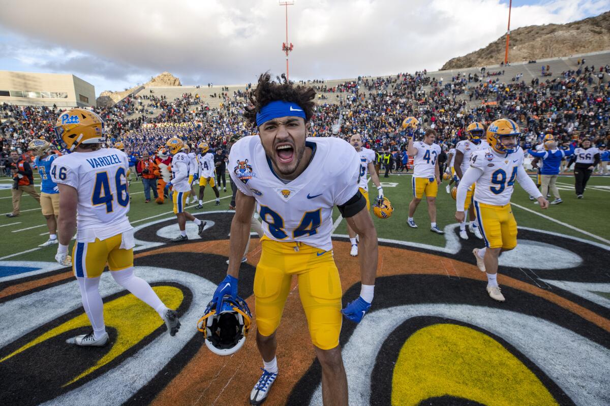 Pittsburgh wide receiver Jake McConnachie celebrates after the Panthers' win.