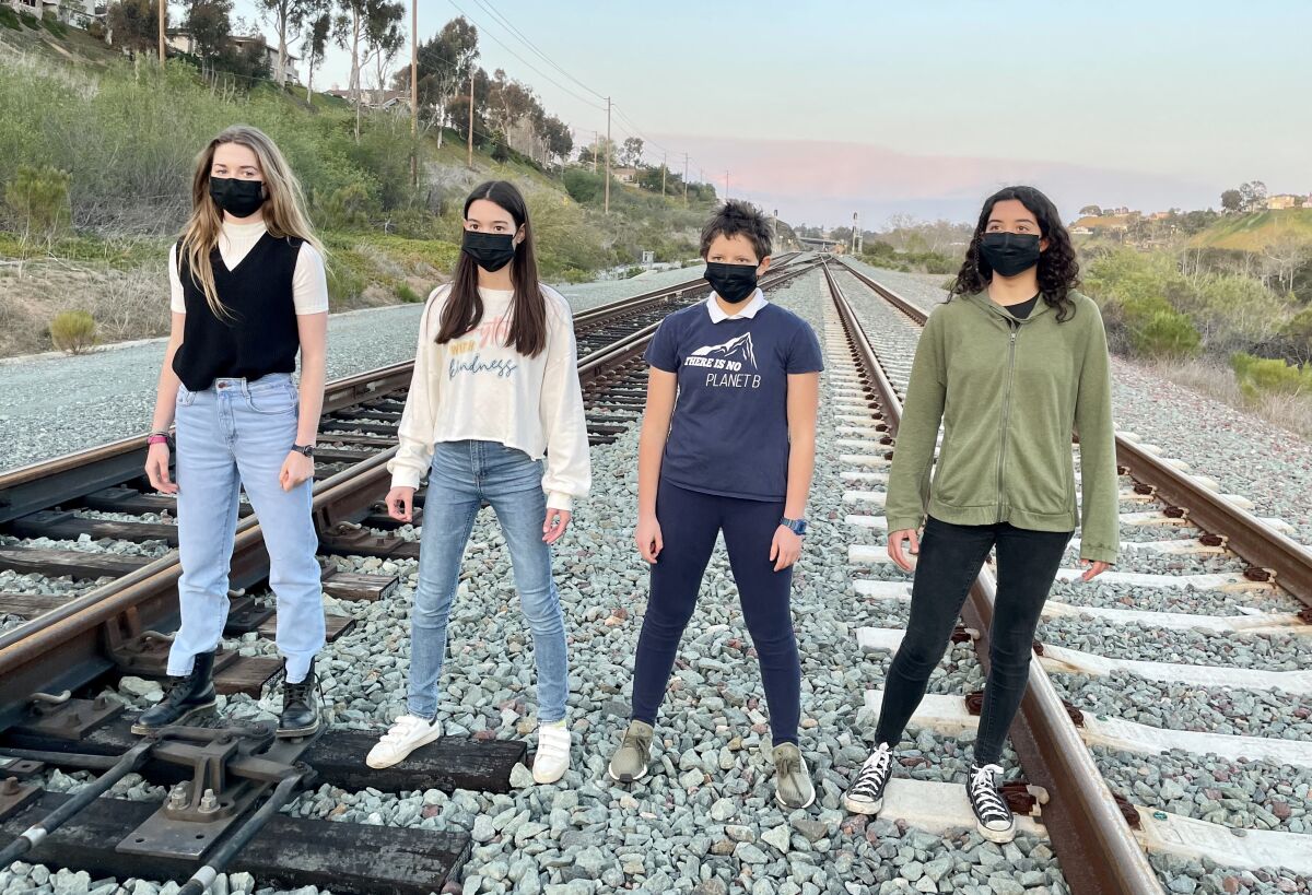Emma Weibel, Solaine Bardin, Elena Grilli and Inji Hamdoun (from left) took third place in the Climate Video Challenge.