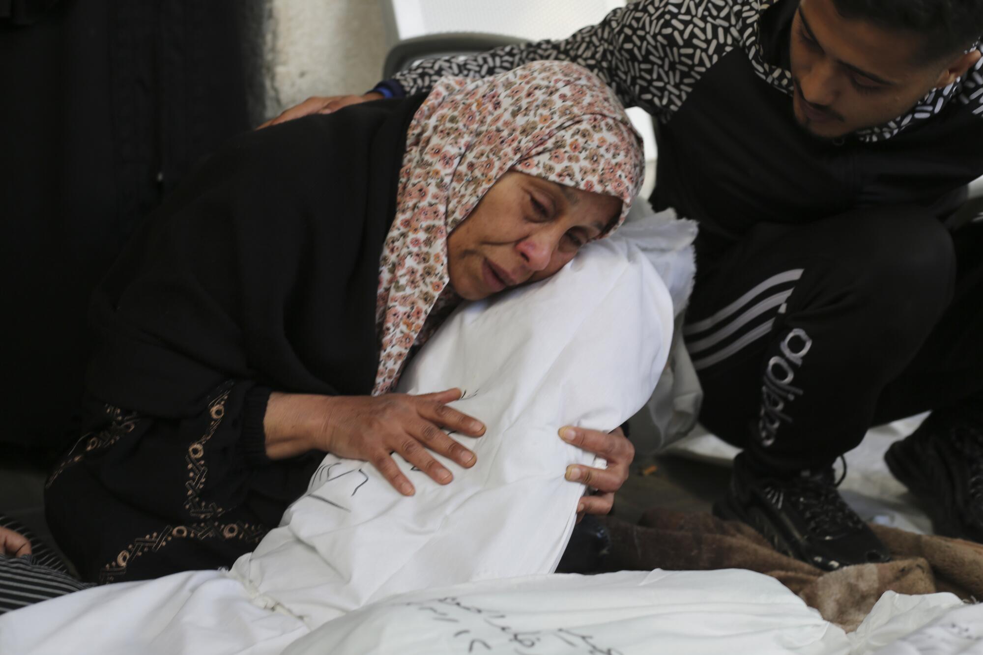 Palestinian woman mourning relative killed in Israeli bombardment of Gaza