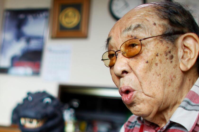 FILE - In this April 28, 2014 photo, original Godzilla suit actor Haruo Nakajima, who has played his role as the monster, speaks during an interview at his home in Sagamihara, near Tokyo. Nakajima, the actor who stomped in a rubber suit to portray the original 1954 Godzilla, has died on Monday, Aug. 7, 2017. He was 88. (AP Photo/Junji Kurokawa, File)