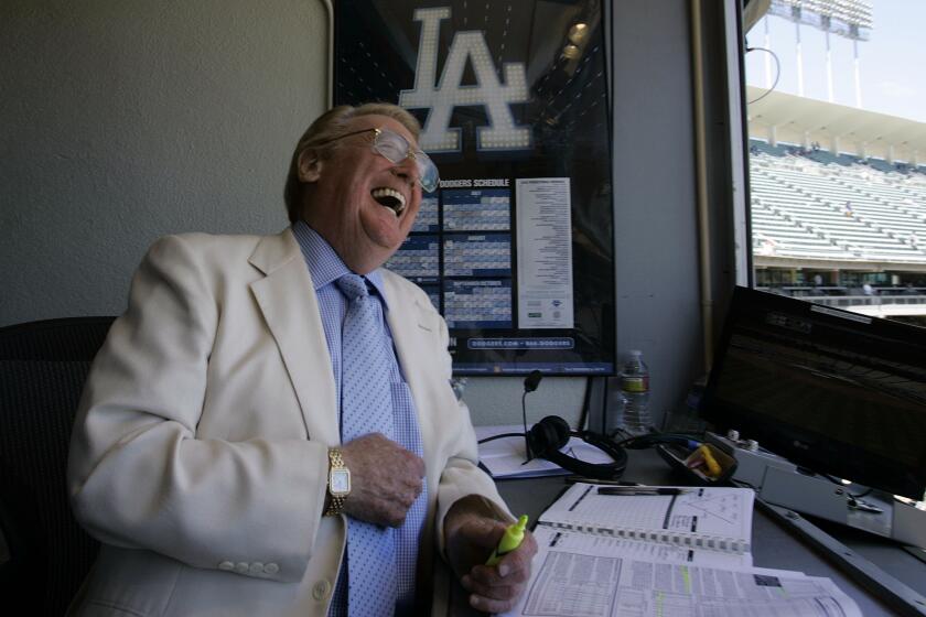 Friedman, Gary –– B58657643Z.1 LOS ANGELES, CALIF. – AUGUST 22, 2010: Hall of Fame Dodger announcer Vin Scully in his announcing booth before the start of the Dodger–Reds game at Dodger Stadium on August 22, 2919. Earlier in the day, the legendary annoucer said he will be returning for his 62nd season next year calling all Dodger home games and those road games against National League West Division opponents. (Gary Friedman/Los Angeles Times)