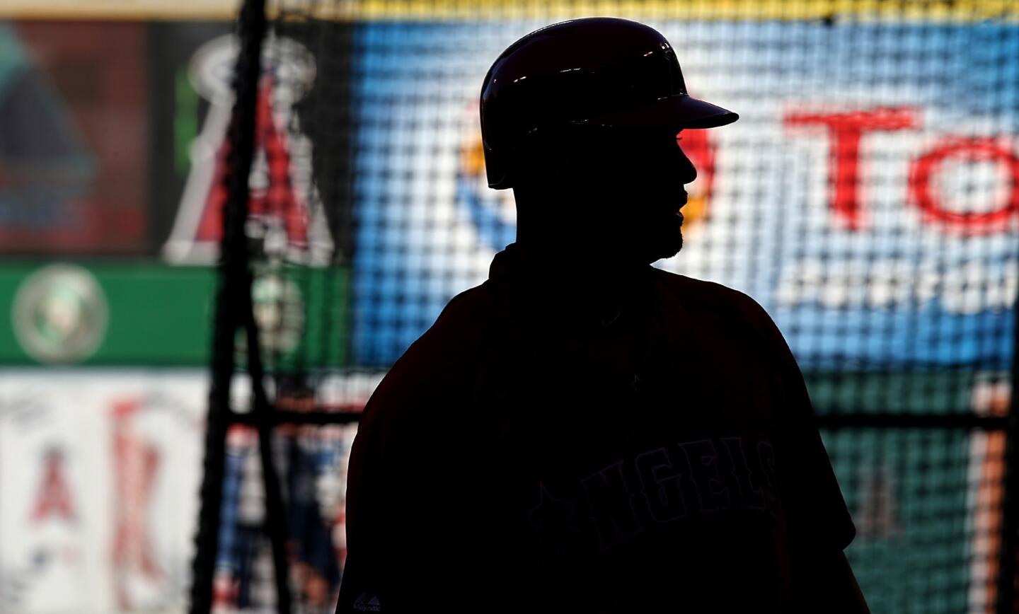 Angels first baseman Albert Pujols takes part in batting practice before the start of the team's 2014 season opener against the Seattle Mariners at Angel Stadium.