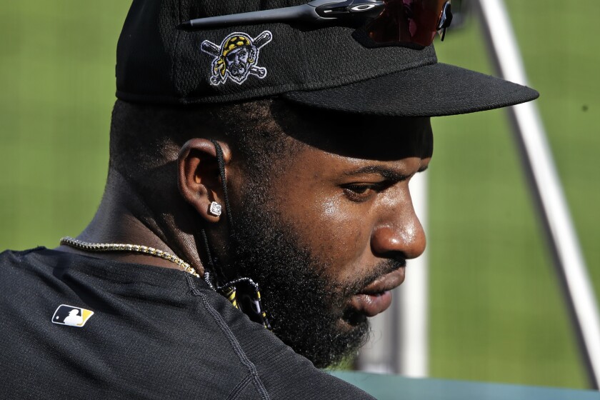 Pittsburgh Pirates Gregory Polanco stands in the dugout during a simulated game at the baseball team's training in Pittsburgh, Wednesday, July 8, 2020. (AP Photo/Gene J. Puskar)
