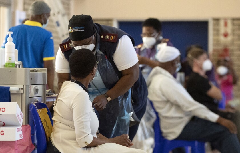 A healthcare worker administers a dose of Johnson & Johnson COVID-19 vaccine in South Africa in March, 2021.