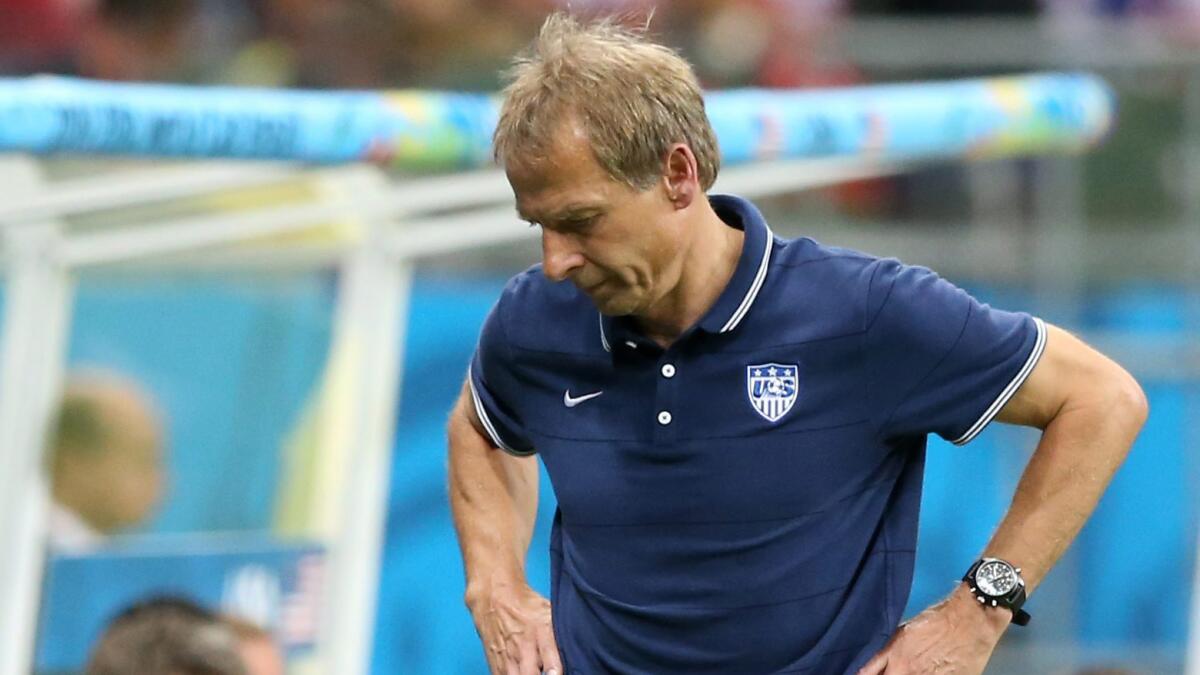 U.S. Coach Juergen Klinsmann reacts during the team's 2-1 loss to Belgium in the World Cup on Tuesday. The U.S. has gone 2-5-4 under three coaches in the World Cup since 2002.