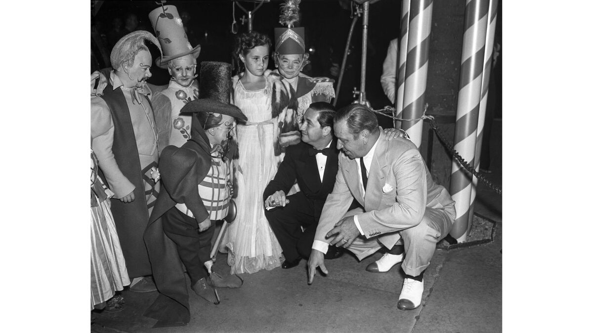 Aug. 15, 1939: Munchkins join the "Wizard of Oz" festivities at the Grauman's Chinese Theatre.