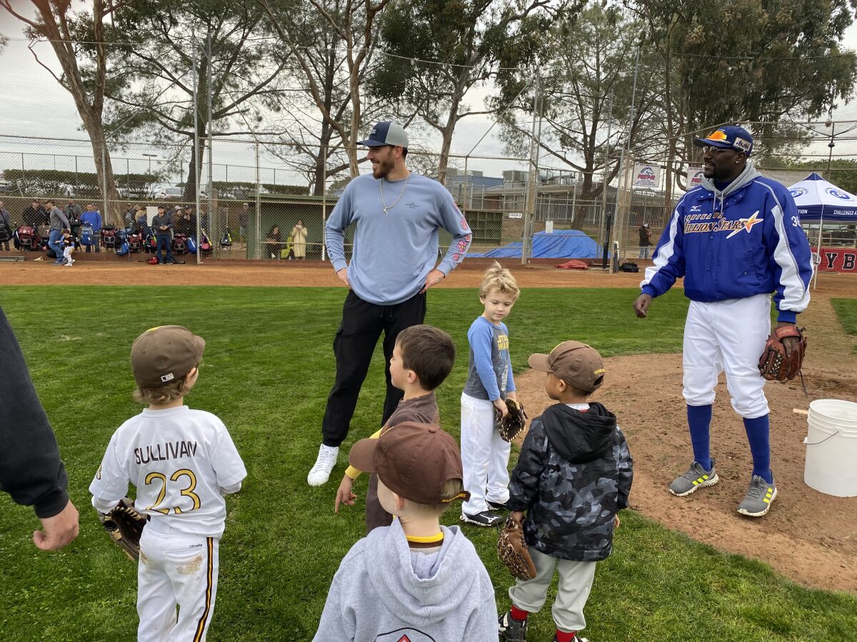 Padres pitcher Joe Musgrove (center) at an event held by La Jolla Youth Baseball and the Challenged Athletes Foundation