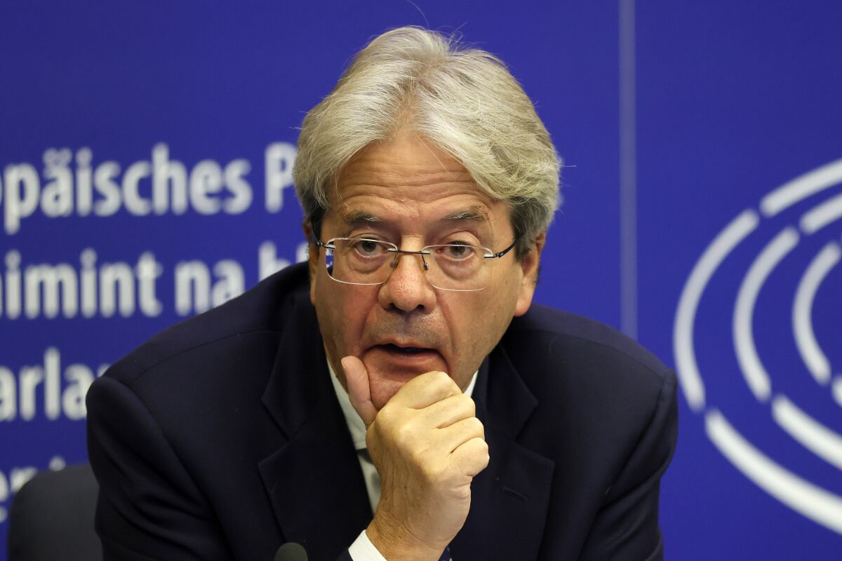 FILE - European Commissioner for Economy Paolo Gentiloni attends a press conference on Oct. 19, 2021 at the European Parliament in Strasbourg, eastern France. “The European economy is moving from recovery to expansion but is now facing some headwinds," EU Commissioner for Economy Paolo Gentiloni said in a statement. Gentiloni cited the energy price spike, rising inflation, the recent increase in COVID-19 infections and supply-chain disruptions that are weighing on numerous industries. (Ronald Wittek, Pool Photo via AP)