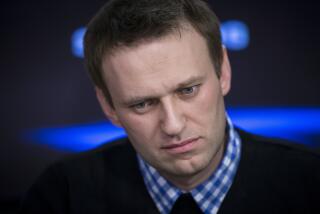 FILE - Russian opposition leader Alexey Navalny listens to a question during an interview at the Echo Moskvy (Echo of Moscow) radio station in Moscow, Russia, Monday, April 8, 2013. (AP Photo/Alexander Zemlianichenko, File)