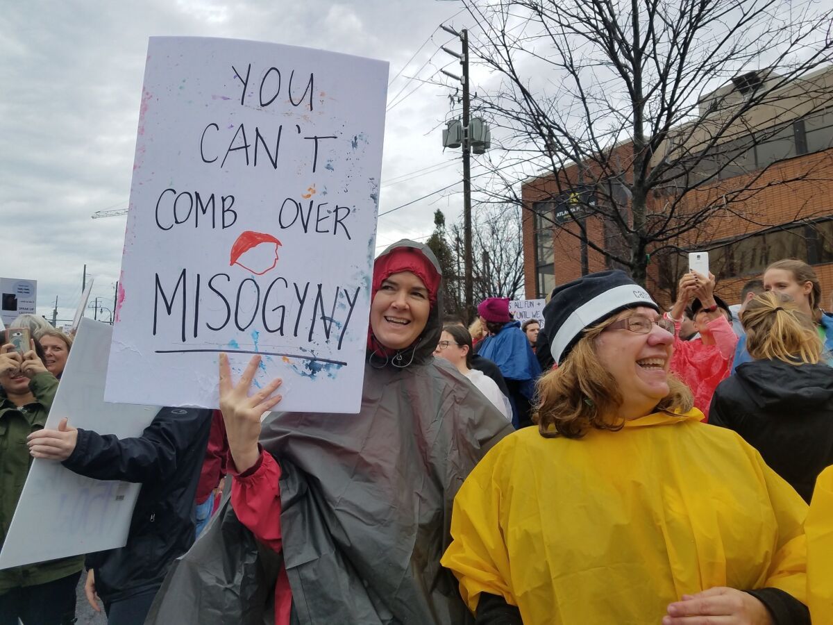 Protesters marched in the rain in Atlanta