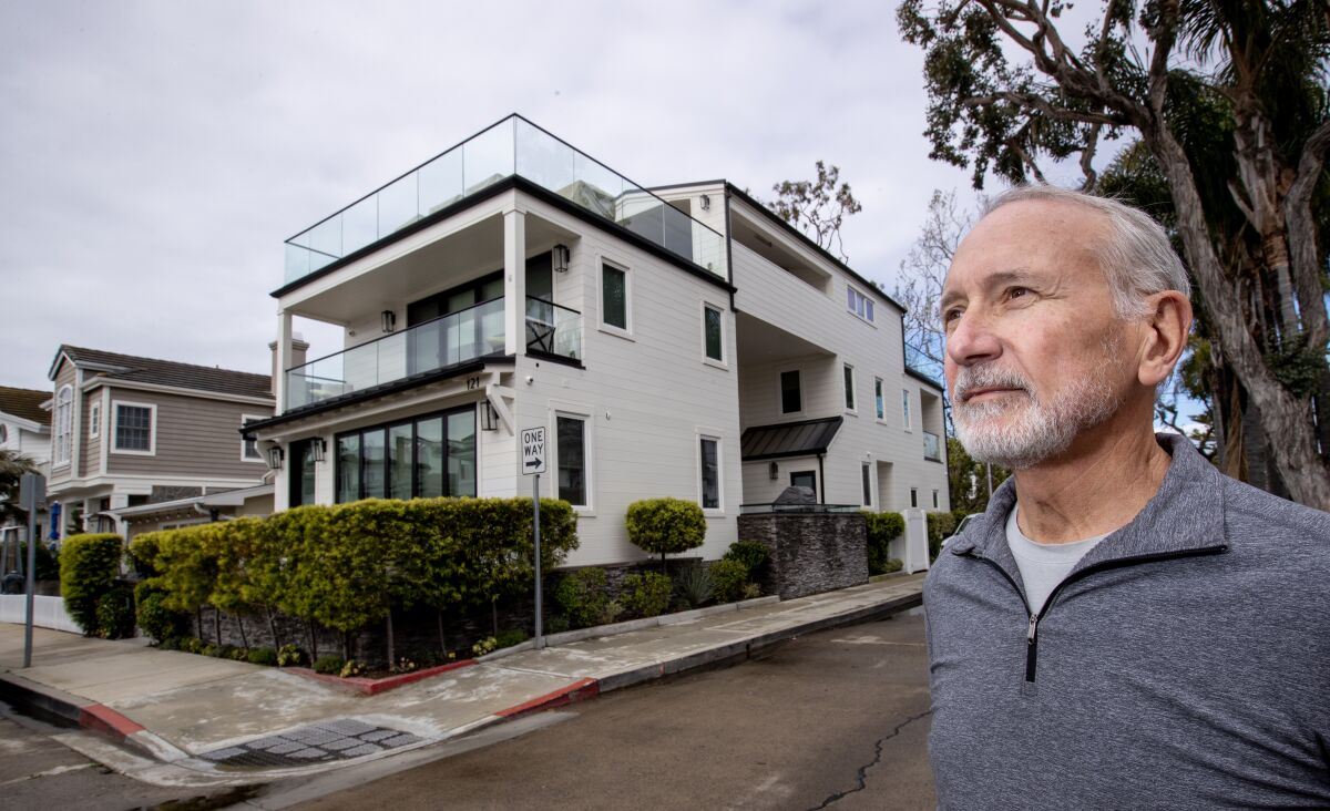 Balboa Island resident Max Gardner stands outside a Pacaso home that was purchased through the fractional ownership model. 