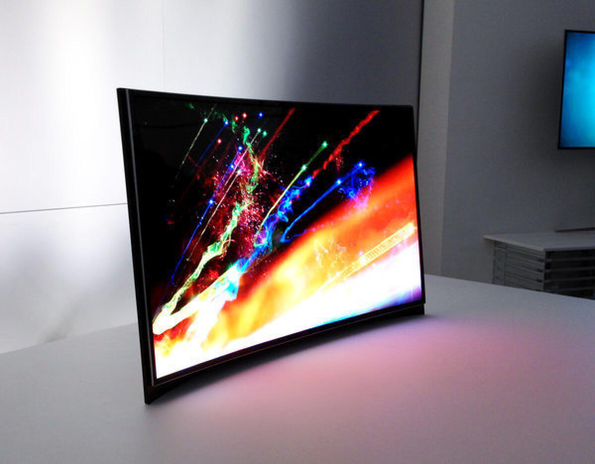 Samsung displays its curved OLED TV at the Consumer Electronics Show in January.