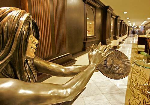 The 156-member Sycuan Band of the Kumeyaay Nation now owns the newly renovated US Grant hotel, named for the 18th president, near downtown San Diego's Gaslamp Quarter. "Sycuan Basket Lady," by sculptor David A. Montour, is among the art and artifacts the tribe has added to the hotel's early-20th century decor.